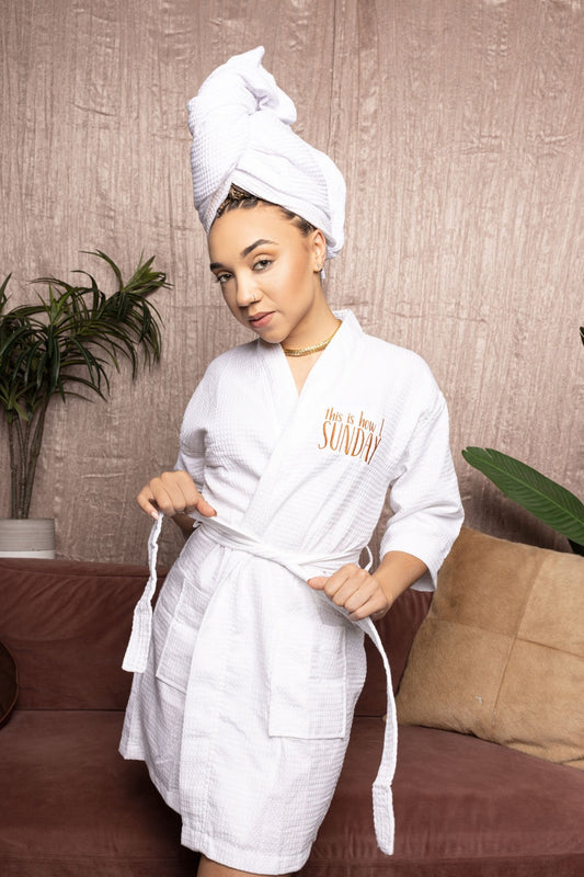 White luxury waffle robe with Sunday logo Embroidery lifestyle photo